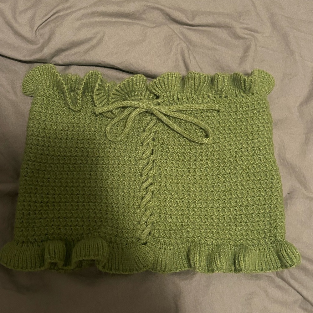 green knit top